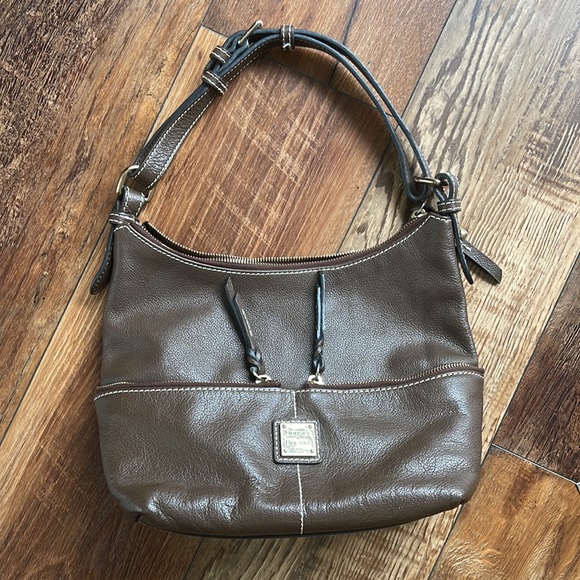 Dooney and Bourke. Brown leather shoulder bag. Has interior stains. - Picture 3 of 14